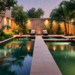 Relaxing spa environment with greenery and water features.