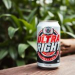 Cold can of Ultra Right Beer on wooden table.