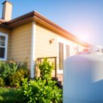 Cozy home with propane tank in a sunny garden.